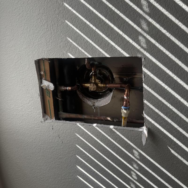 Moen shower valve installation behind wall panel