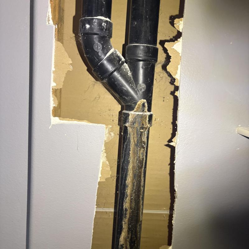 DWV ABS vent and stack pipe behind drywall