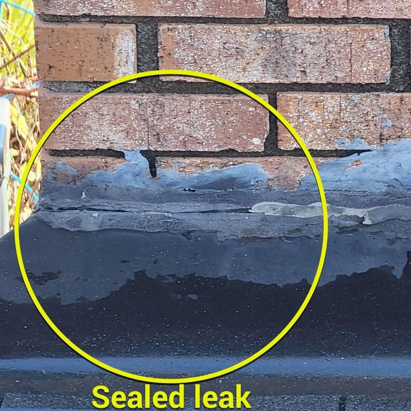 Chimney base flashing with sealed leak and sealant