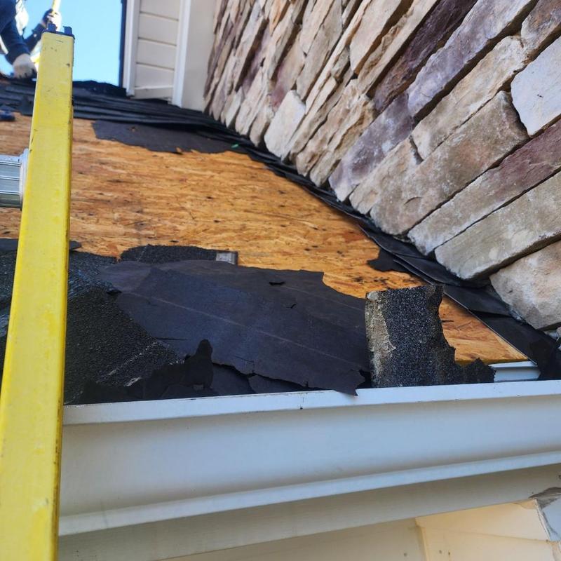 Eyebrow roof decking with dry rot and ice shield removal
