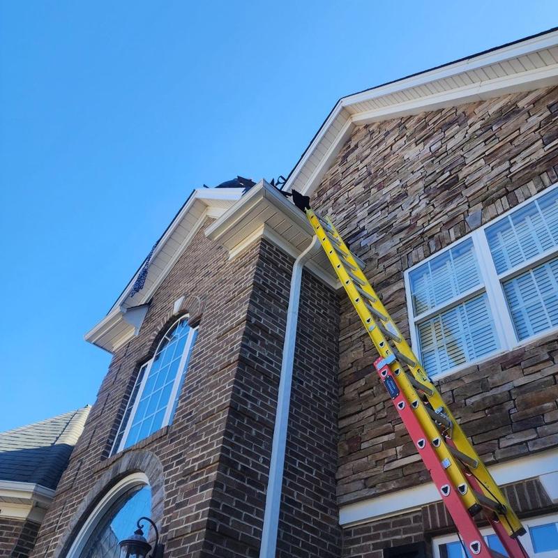 Eyebrow roof leak with ladder and shingle removal