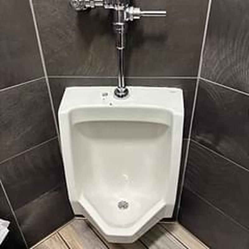 Urinal drain and flush valve with plumbing pipes Urinal drain and flush valve with plumbing pipes