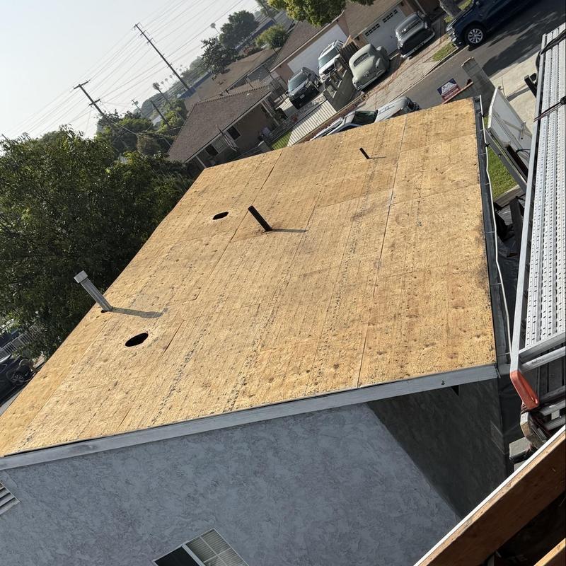 Roof decking installation on residential flat roof