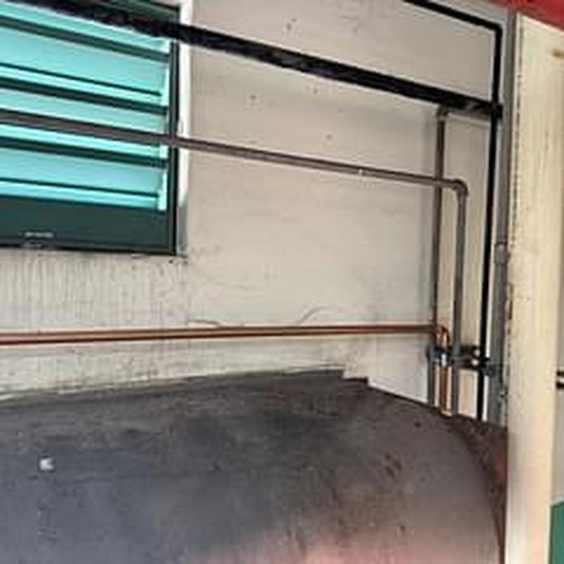 34 copper line installation in boiler room wall