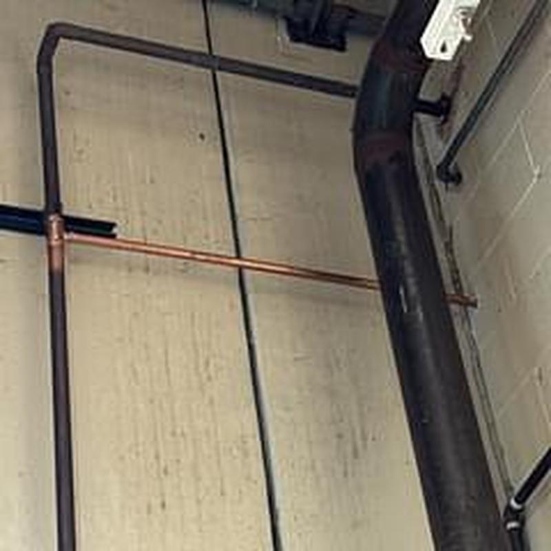 34 copper water line installation in boiler room wall