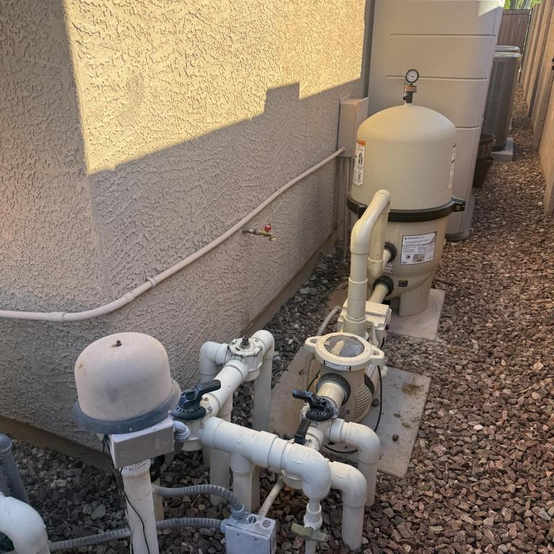 Pool filtration system with valves and pressure gauge