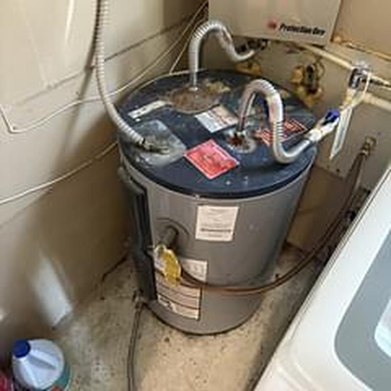 30-gallon electric water heater in utility room 30-gallon electric water heater in utility room
