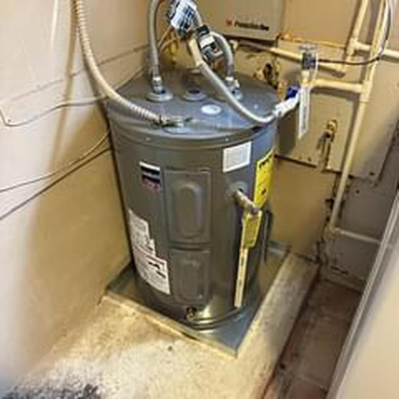 30-gallon electric water heater installed in utility room 30-gallon electric water heater installed in utility room