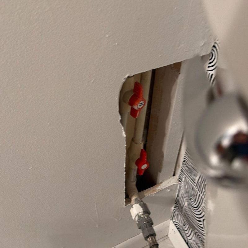 Water shutoff valves behind drywall access panel Water shutoff valves behind drywall access panel
