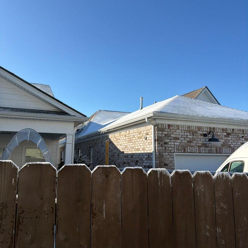 Roof shingles and gutters with frost buildup