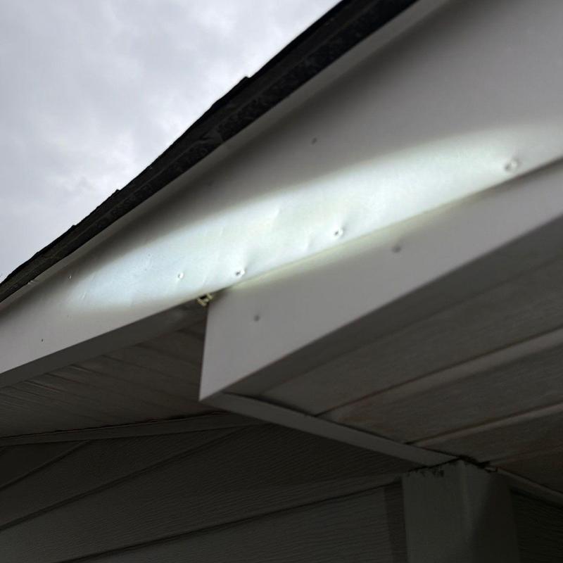 Eavestrough fascia damage from hail impact