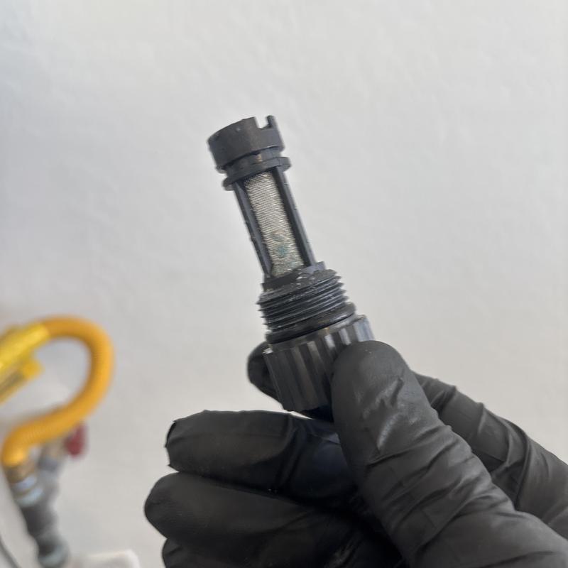 Universal toilet fill valve mesh screen close-up