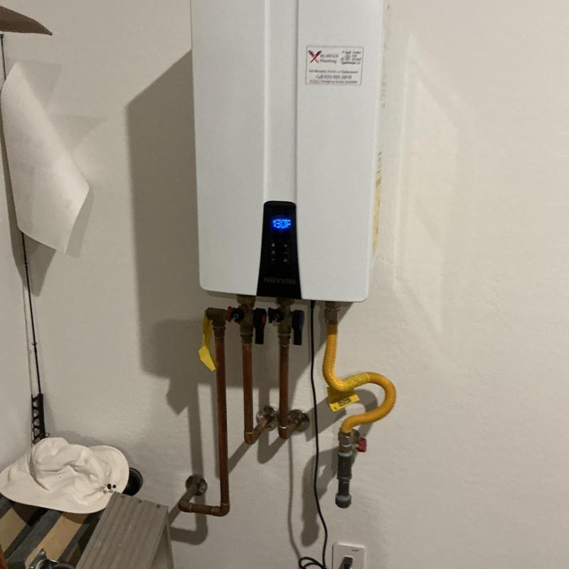 Tankless water heater with copper and gas piping