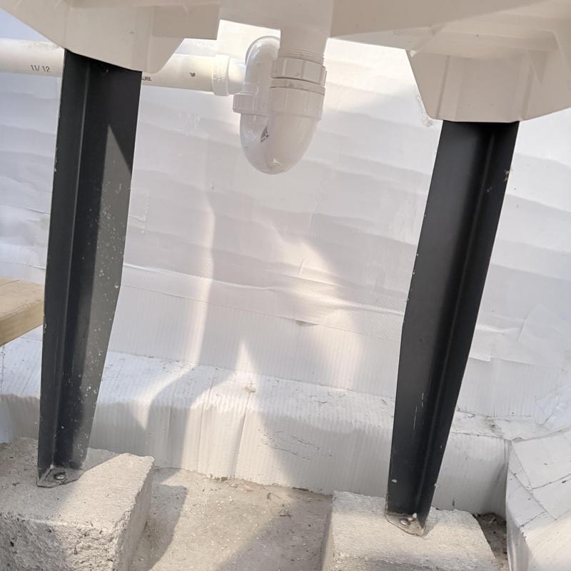 Shop sink drain and pipe installation with supports Shop sink drain and pipe installation with supports