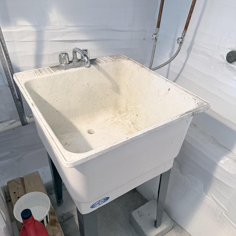 Shop sink with faucet and copper valve pipes installation Shop sink with faucet and copper valve pipes installation
