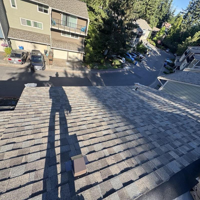 Asphalt shingle roof replacement in residential neighborhood