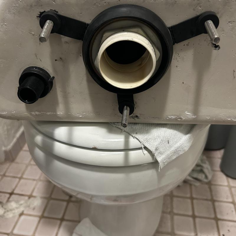 Toilet tank-to-bowl gasket and flange installation