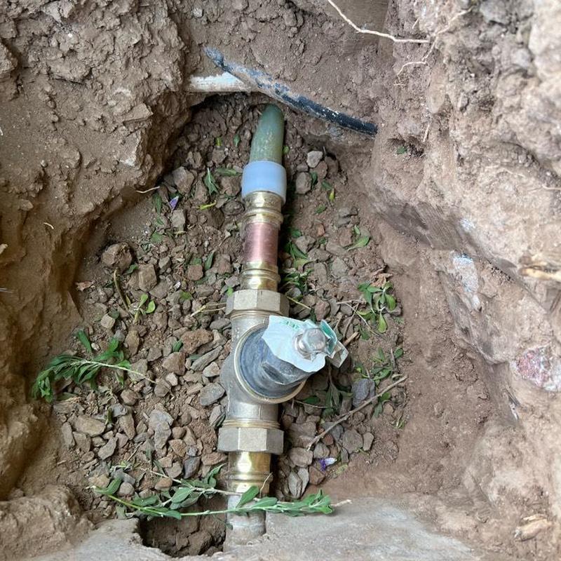 Pressure-reducing valve installed on buried water line