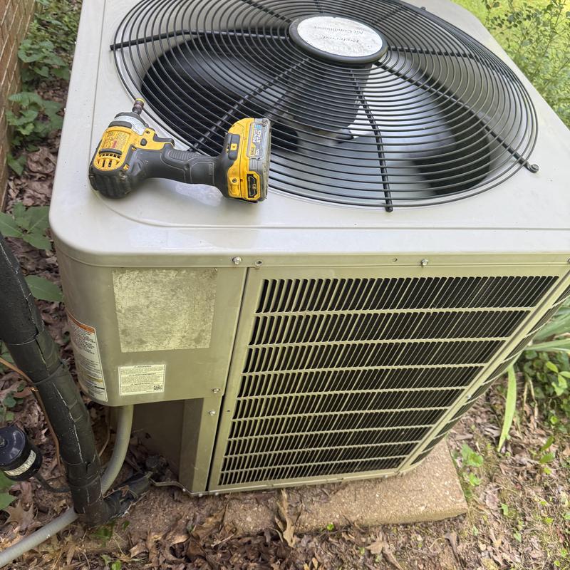 Air conditioner outdoor unit with drill on top Air conditioner outdoor unit with drill on top