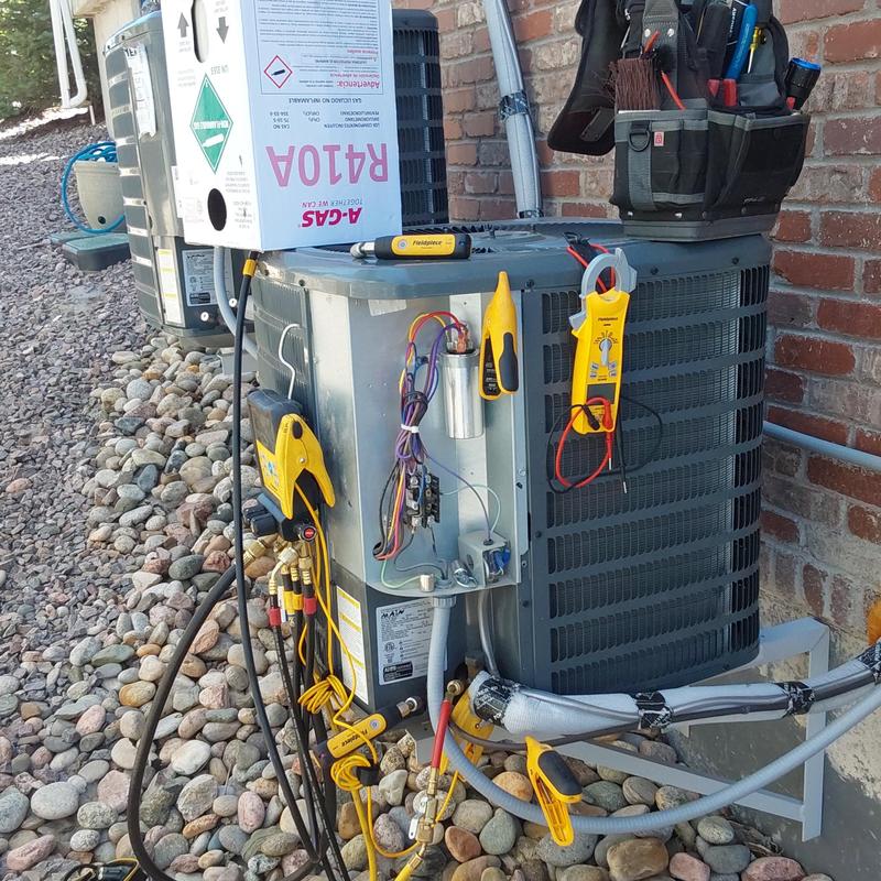 Goodman air conditioner with diagnostic tools connected