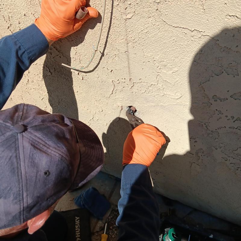 Copper water line repair on exterior hosebib wall