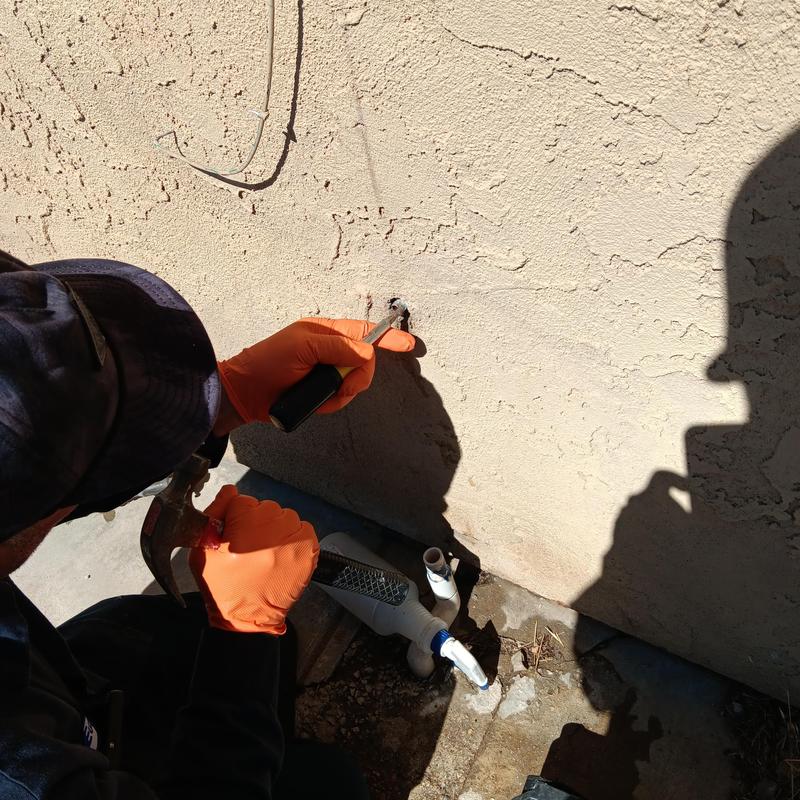 Copper water line repair at exterior hose bib in backyard