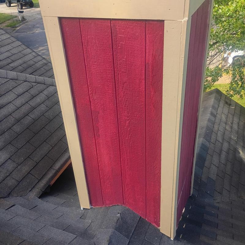 Chimney flashing and corner board rebuild on roof