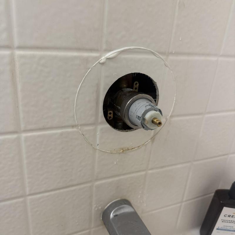 Delta shower cartridge installation in tiled wall
