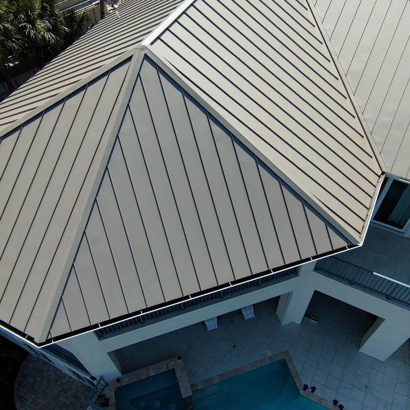 Standing seam metal roof on residential home view Standing seam metal roof on residential home view