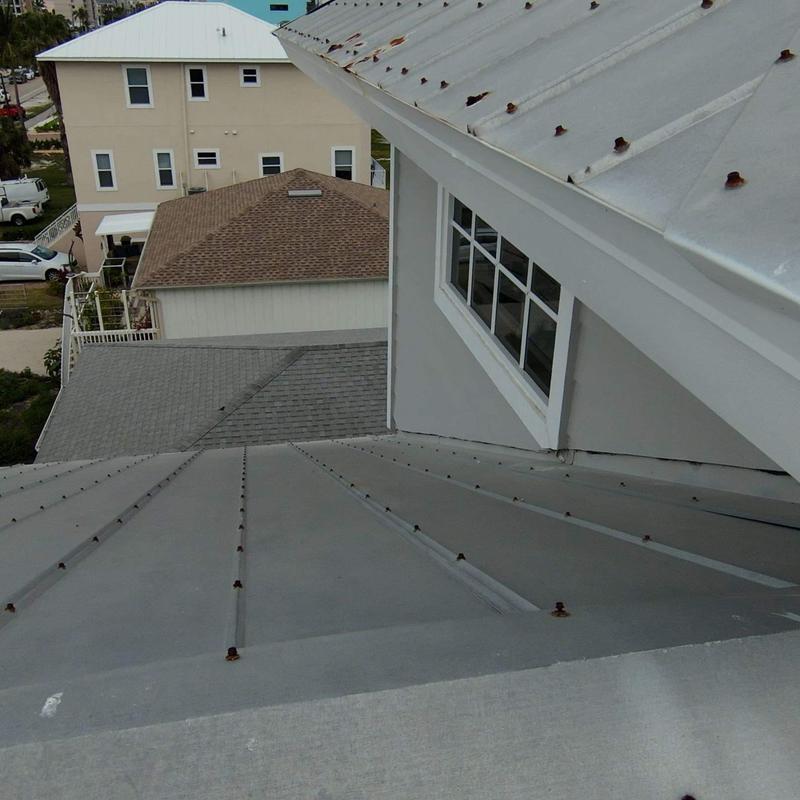 Metal roof corrosion and fastener failure near window Metal roof corrosion and fastener failure near window