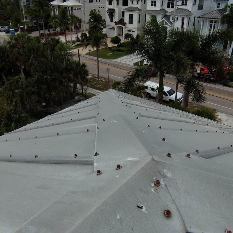 Corroded metal roof with rusted fasteners in Florida Corroded metal roof with rusted fasteners in Florida