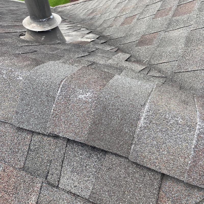 Architectural shingles with vent pipe flashing repair