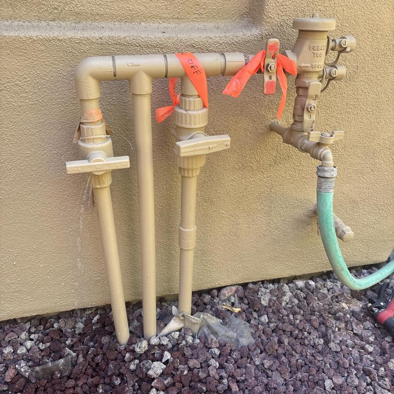 Water line with valve assembly and hose connection