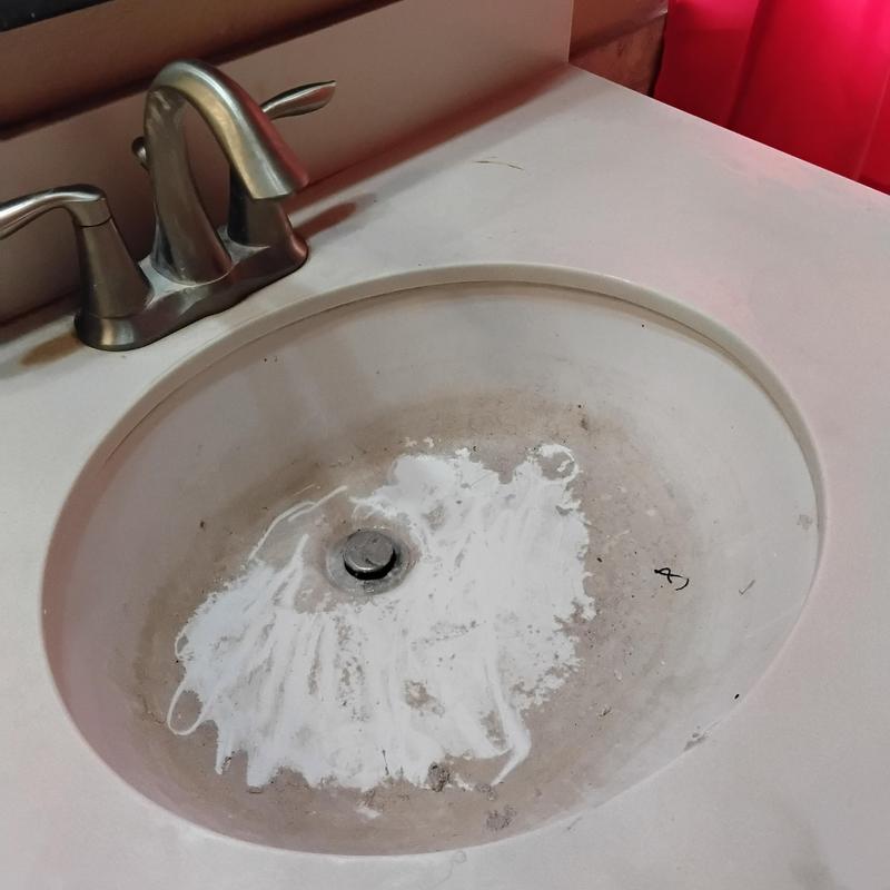 Jack and Jill lavatory sink with damaged basin surface