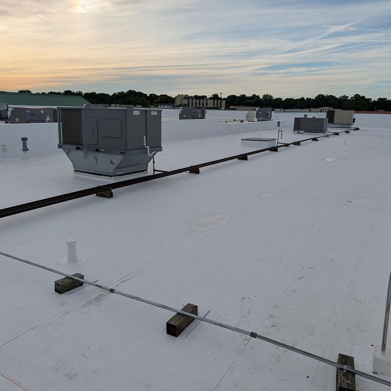 TPO single ply flat commercial roof with HVAC units