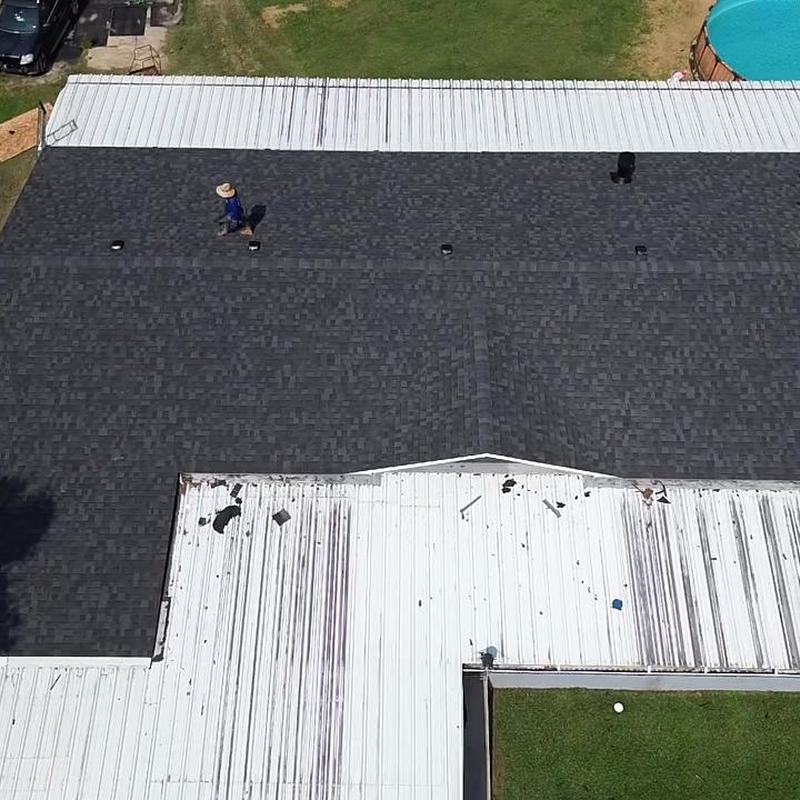 Asphalt shingle roof replacement on metal building