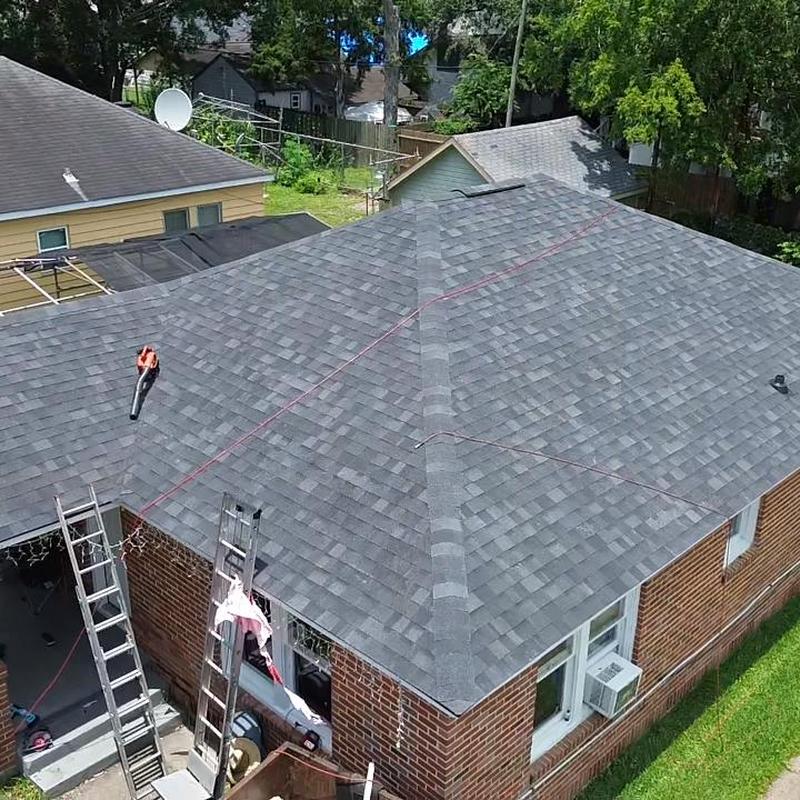 Asphalt shingle roof replacement with ladders in Baytown