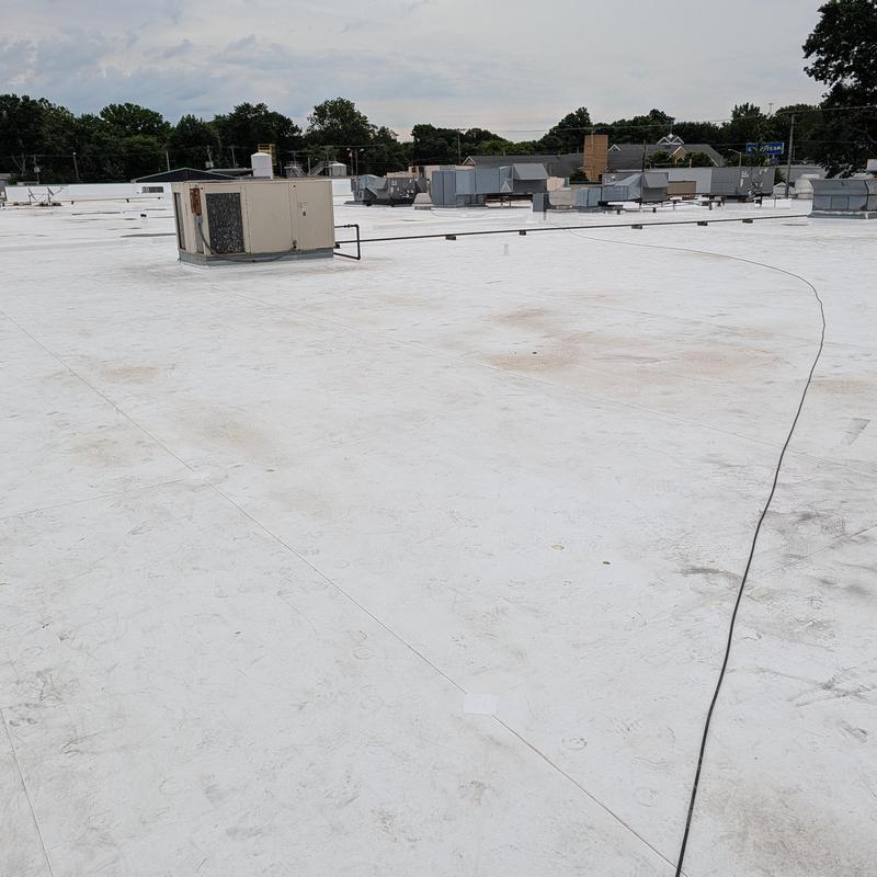 TPO single ply commercial flat roof with HVAC units
