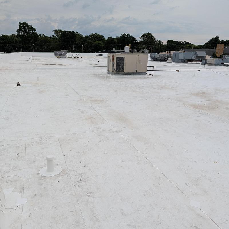 TPO single ply commercial roof with HVAC units