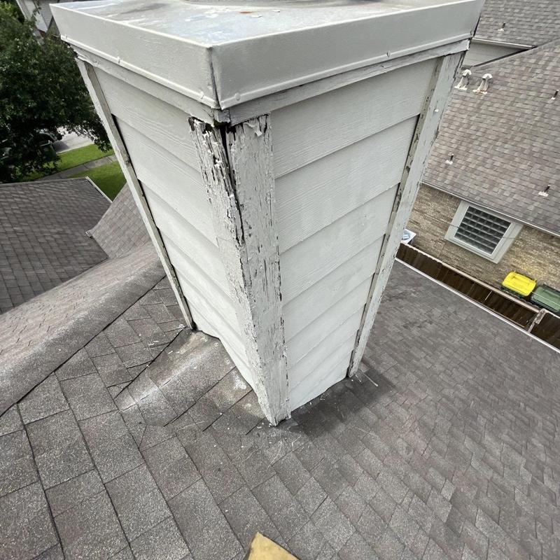 Chimney siding wood rot and damaged metal cap
