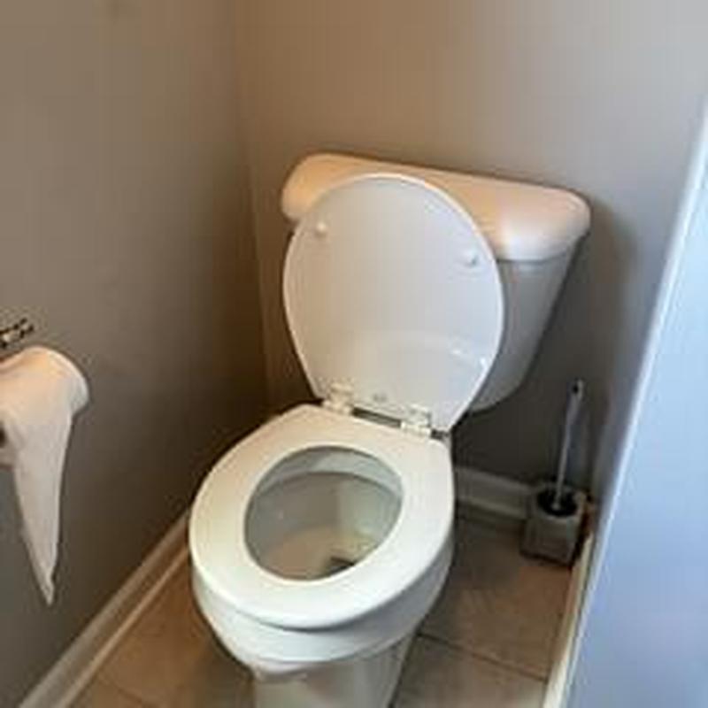Mansfield round bowl toilet with open lid installation