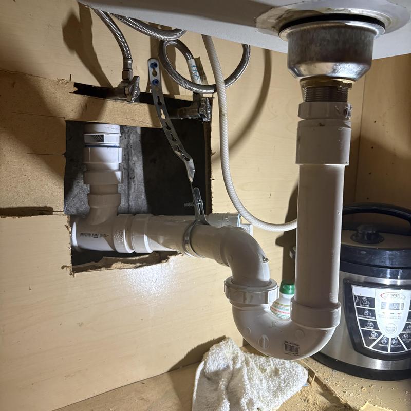 PVC kitchen sink drain pipe with new trap and fittings PVC kitchen sink drain pipe with new trap and fittings