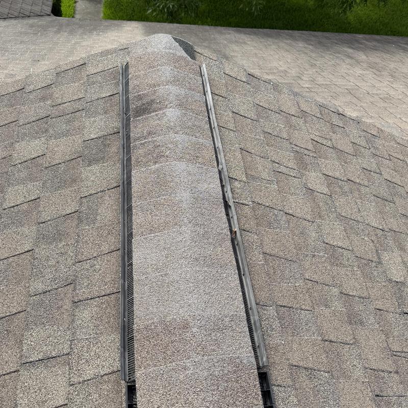 Roof ridge vent on asphalt shingle roof in Baytown TX