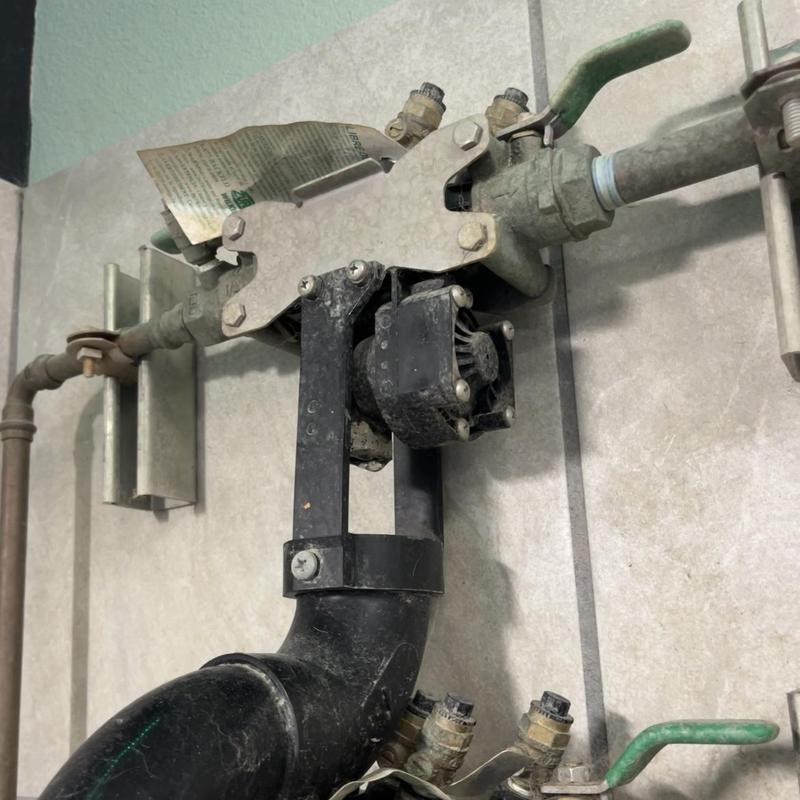 Backflow assembly with relief valve and piping