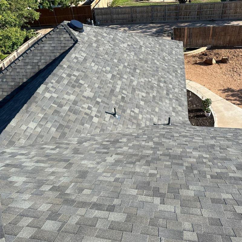 Malarkey asphalt shingle roof with black vent pipes
