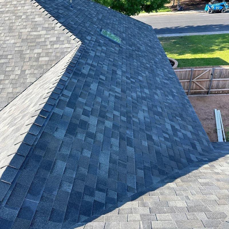 Malarkey Vista black shingle roof installation on home