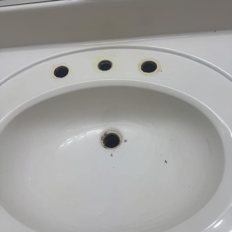 Bathroom sink with faucet and drain holes removed