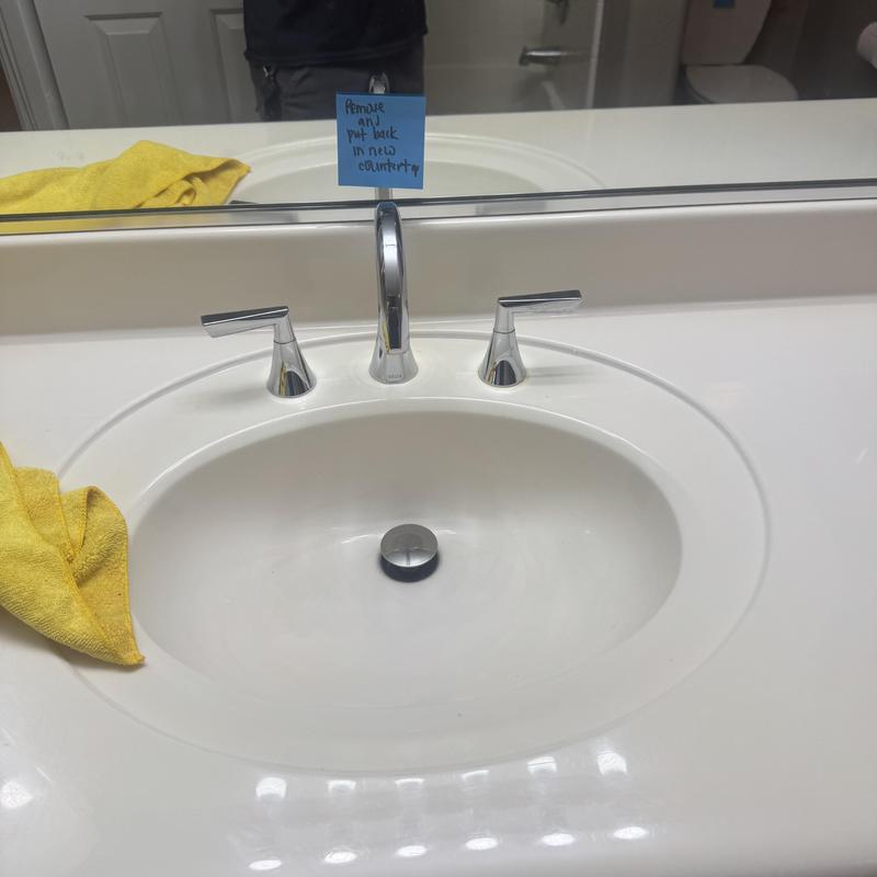 Bathroom sink faucet with dual handles in countertop