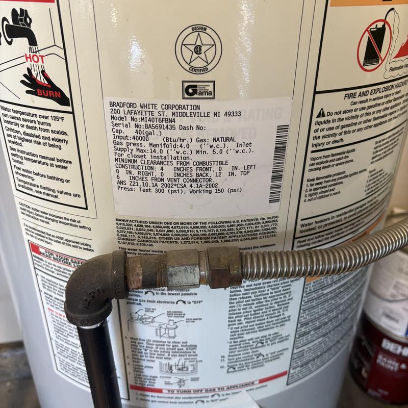 Gas water heater with new flex gas line and fittings Gas water heater with new flex gas line and fittings