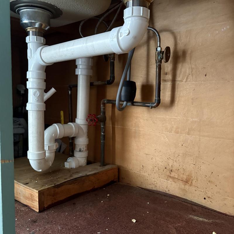 PVC sink drain system with new vent and cleanout PVC sink drain system with new vent and cleanout